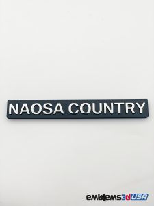 EMBLEMA NAOSA COUNTRY